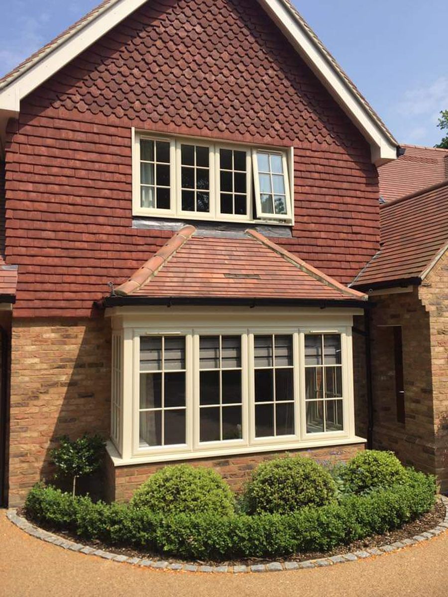 The same home before, with cream frames